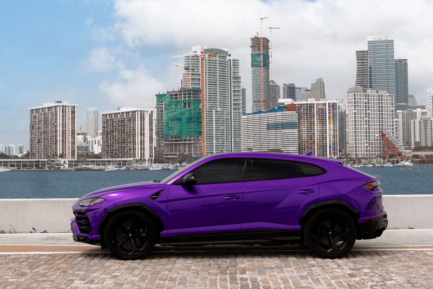 Purple Lamborghini Urus side profile